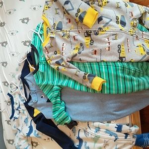 A bundle of Carter's fleece footie pajamas